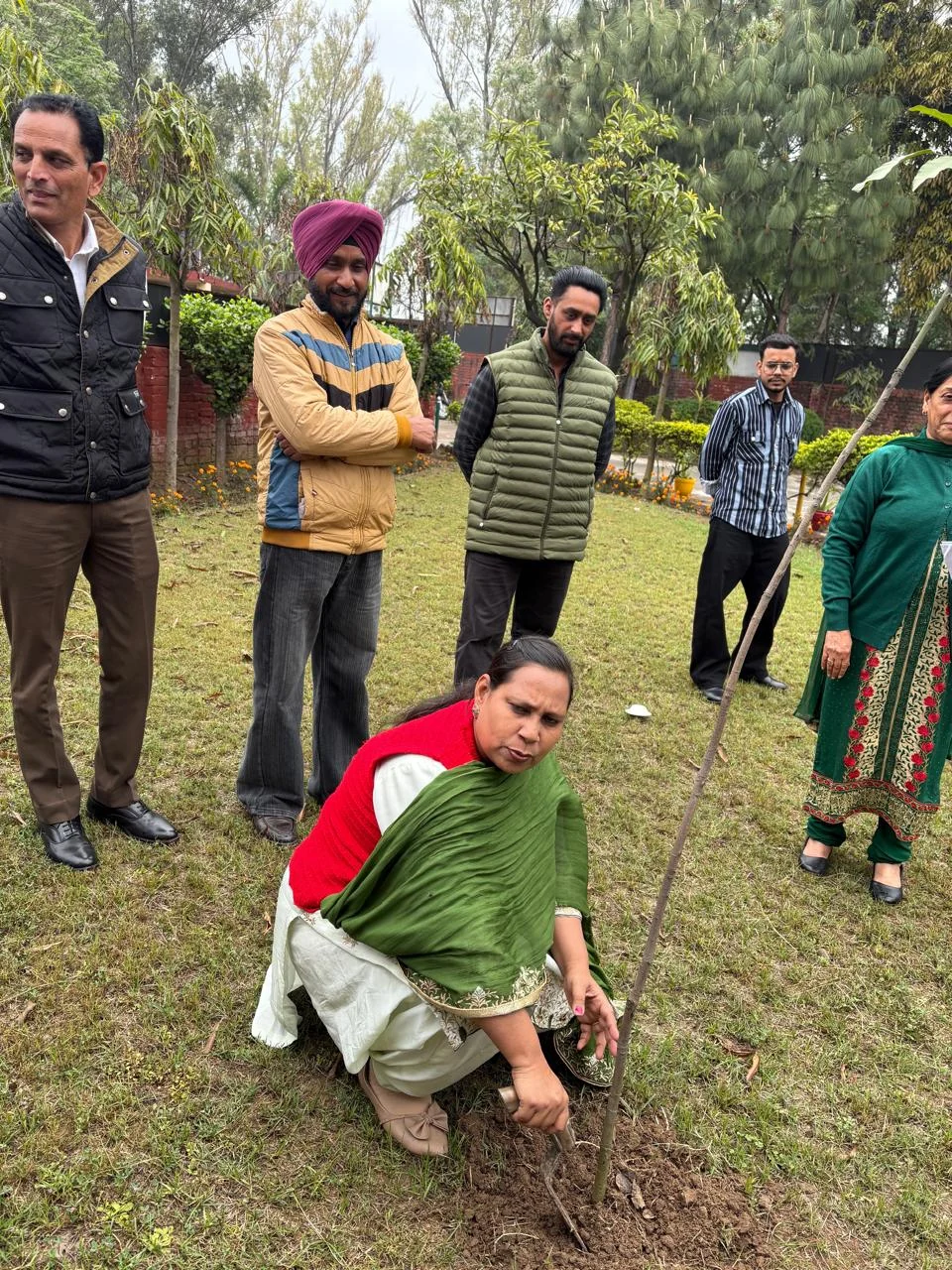 A Pine Grove College of Education NSS participant planting a sapling during the seven-day camp on 20 March 2026.