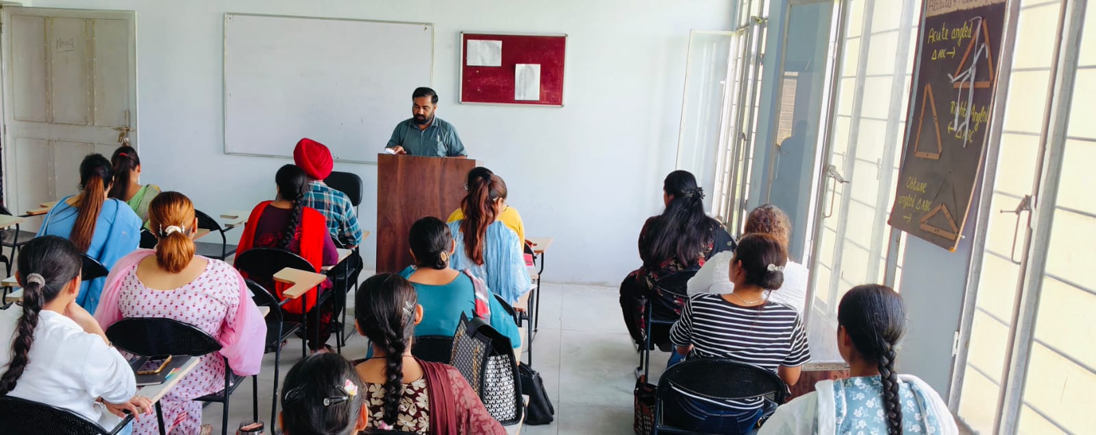 A lecturer addressing College of Education students